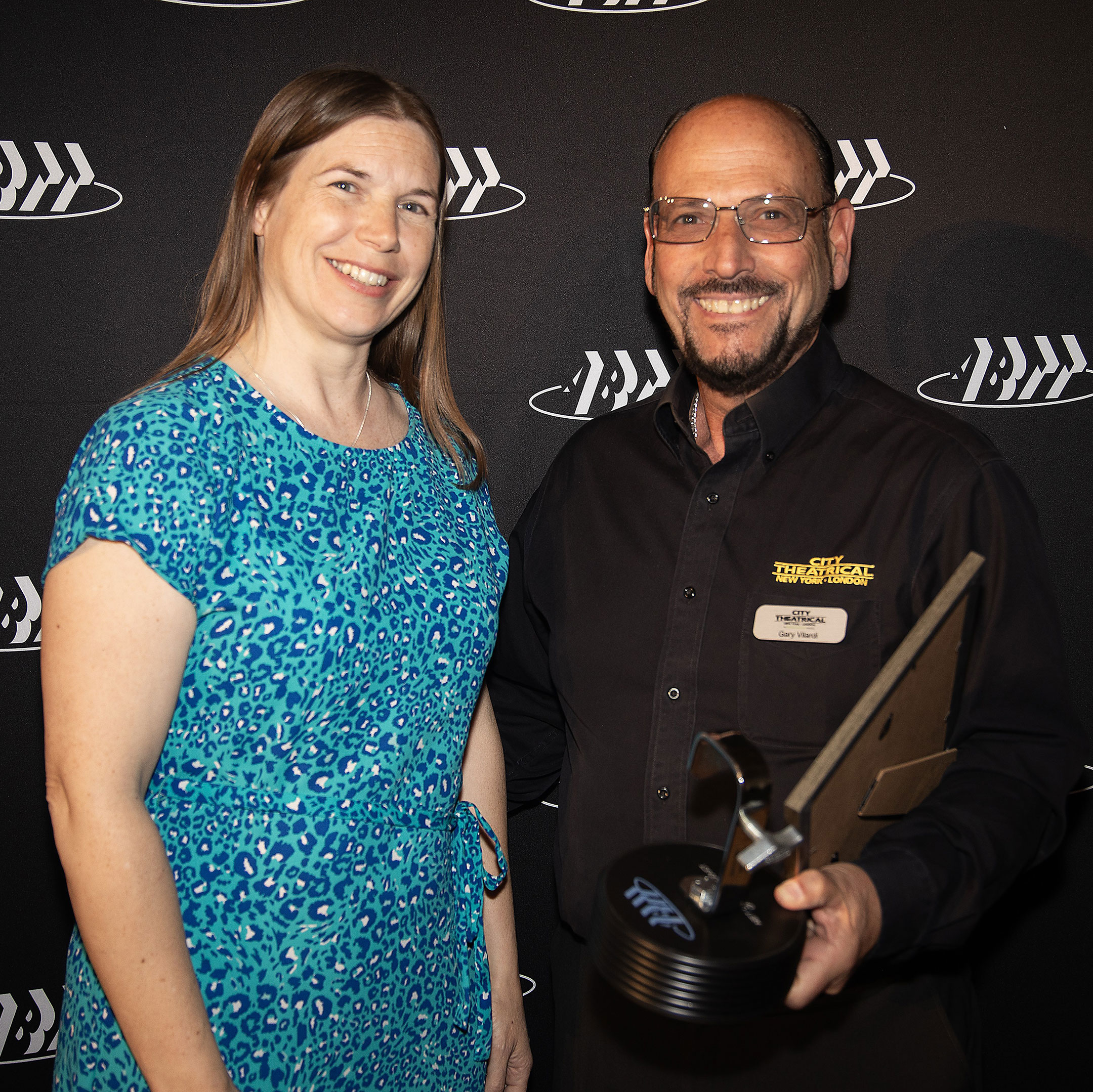 2024-06-06 ABTT CEO Liz Sillett and Gary Vilardi of City Theatrical, accepting ABTT Lighting Product of the Year Award for Multiverse Connect Module