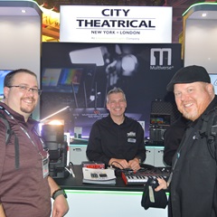 John Demous and colleagues at the City Theatrical booth